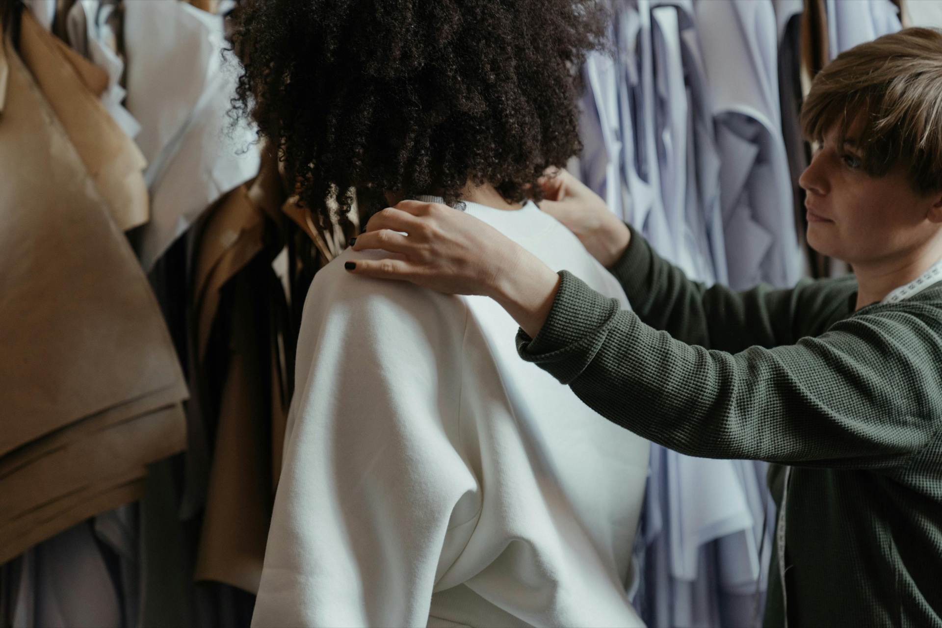 Skilled machinist working in a UK clothing factory specialising in small-run production for independent brands