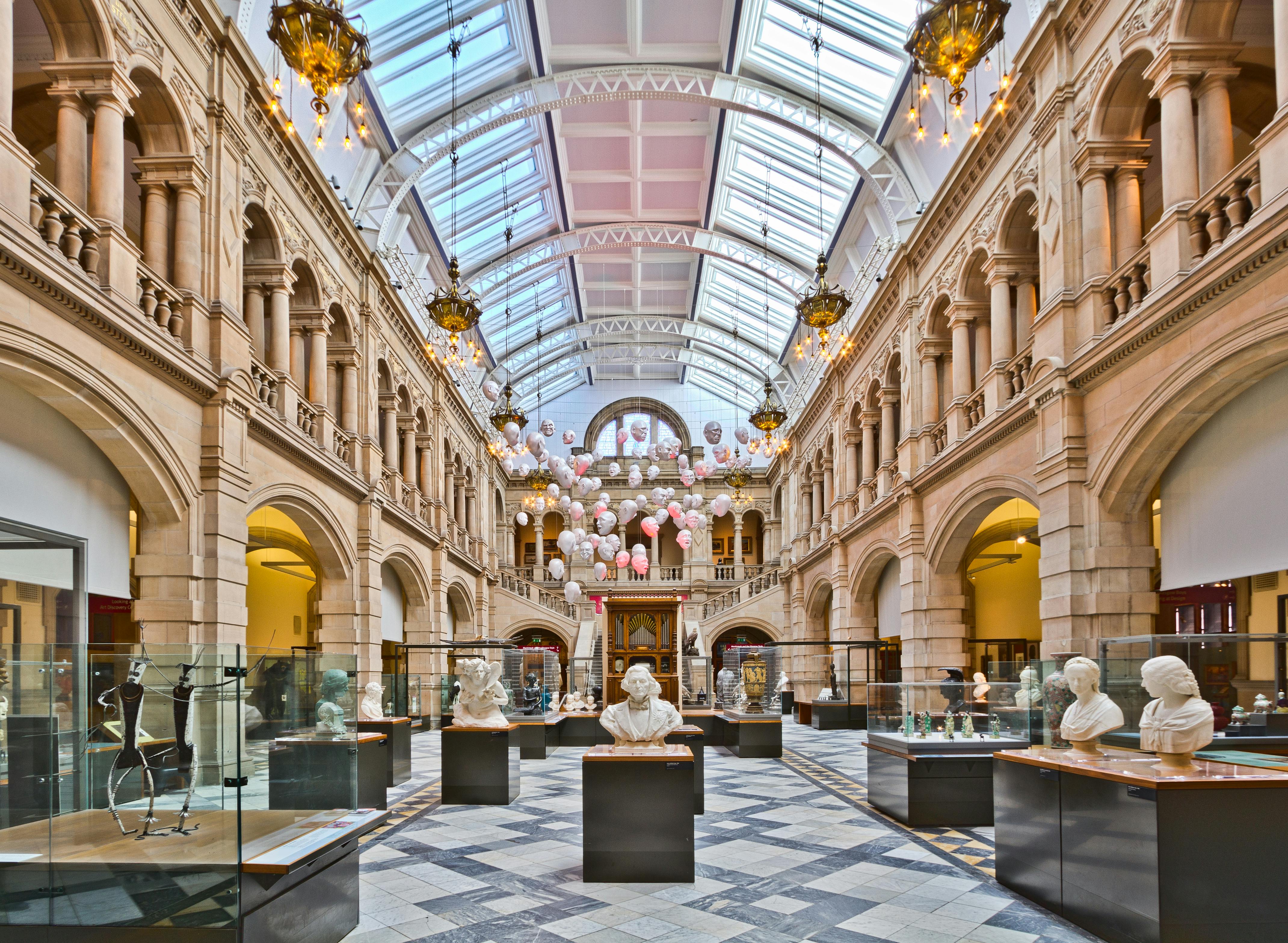 Printed silk scarves and heritage merchandise produced for a museum gift shop, photographed as a finished collection.